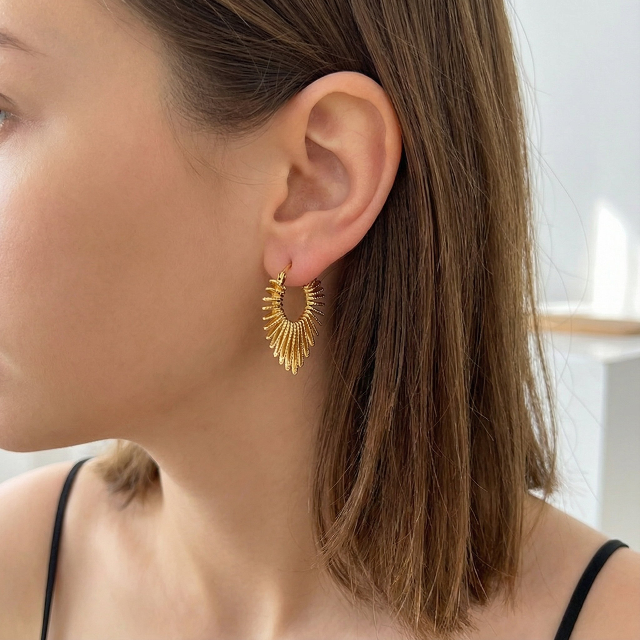 Golden Fan-Shaped Hoop Earrings with Textured Details