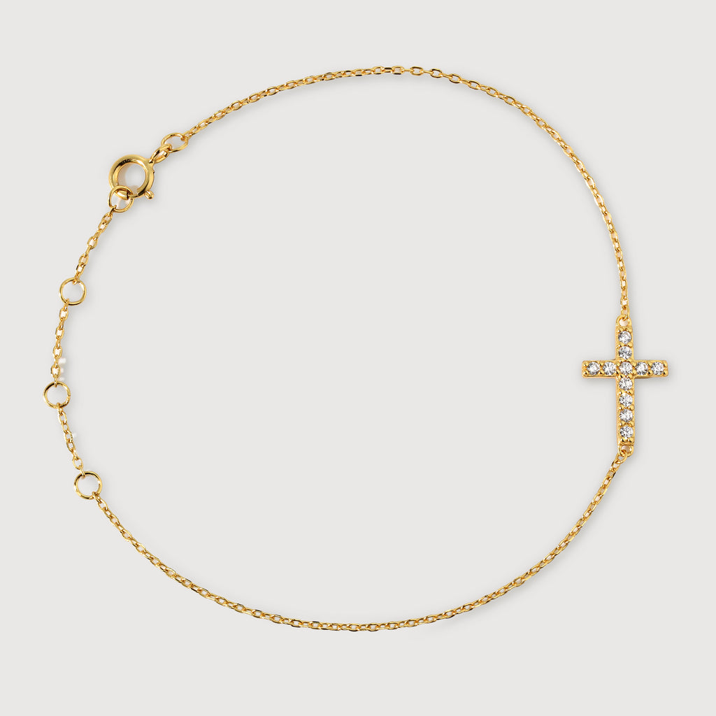 Elegante pulsera de circón con cruz