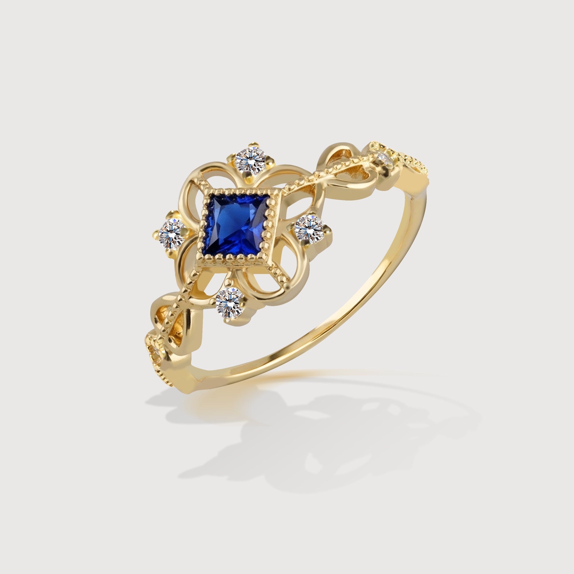 Anillo de oro con circonita azul