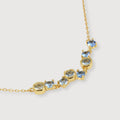 Elegante collar de oro con circonita azul