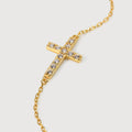 Elegante pulsera de circón con cruz