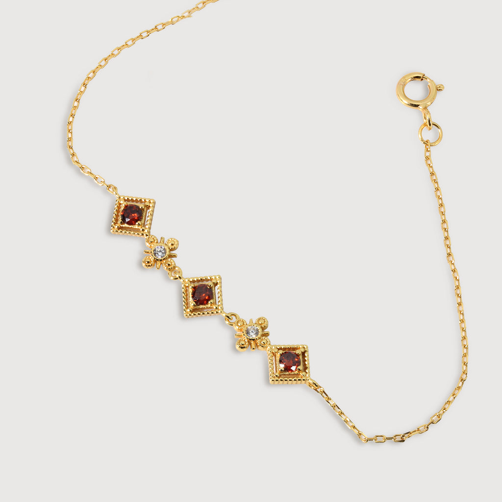Pulsera Regal Roja de Zircón y Oro