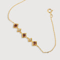 Pulsera Regal Roja de Zircón y Oro