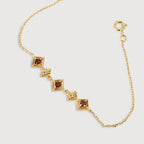 Pulsera Regal Roja de Zircón y Oro
